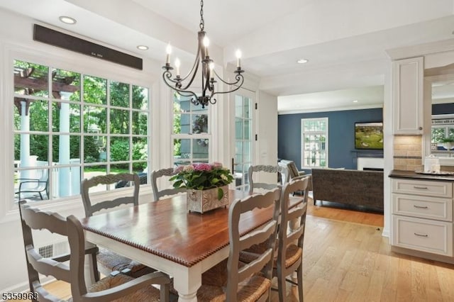 23 Parkview Rd, Chatham Twp, NJ 07928 - dining space featuring light wood finished floors, a chandelier, recessed lighting, and lofted ceiling