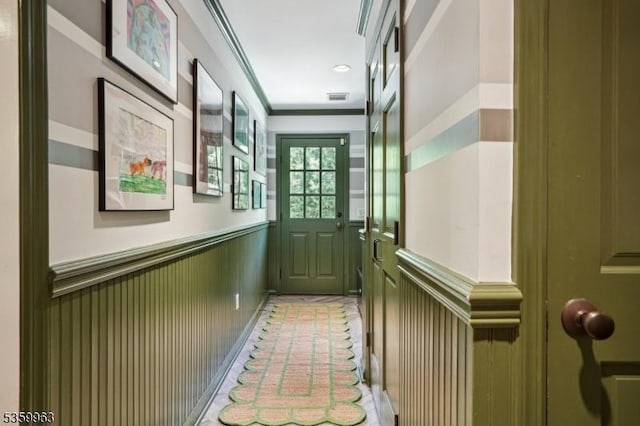 23 Parkview Rd, Chatham Twp, NJ 07928 - doorway to outside featuring a wainscoted wall and crown molding