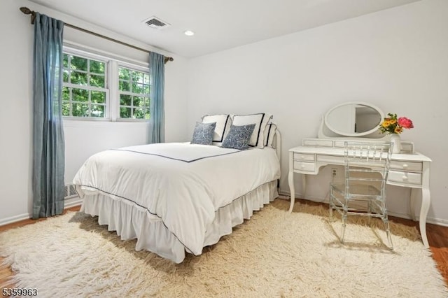 23 Parkview Rd, Chatham Twp, NJ 07928 - bedroom with baseboards and wood finished floors