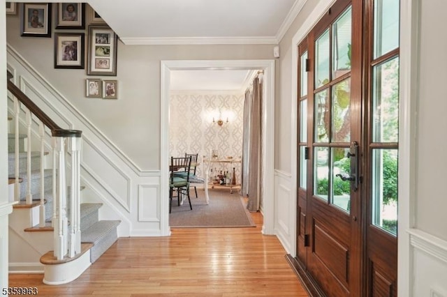 23 Parkview Rd, Chatham Twp, NJ 07928 - foyer entrance with stairway, a decorative wall, light wood-style flooring, wainscoting, and ornamental molding