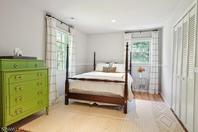23 Parkview Rd, Chatham Twp, NJ 07928 - bedroom featuring multiple windows, baseboards, a closet, light wood-style flooring, and recessed lighting