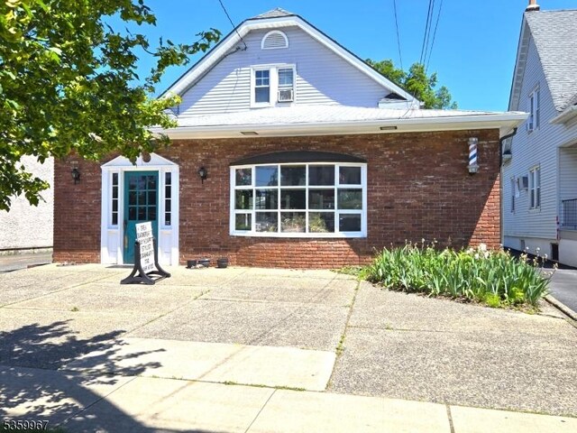 307 W Union Ave, Bound Brook Boro, NJ 08805 - view of front of home featuring brick siding
