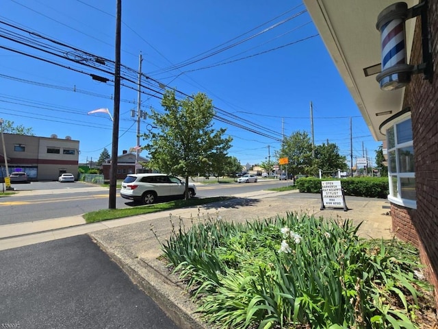 307 W Union Ave, Bound Brook Boro, NJ 08805 - view of asphalt road featuring street lighting, curbs, and sidewalks