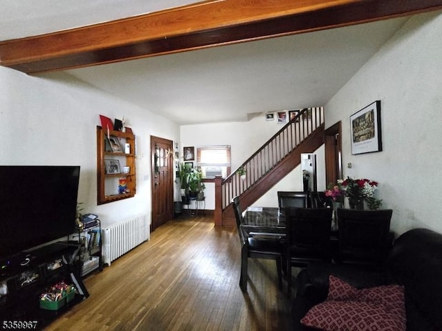 307 W Union Ave, Bound Brook Boro, NJ 08805 - living area featuring radiator, wood finished floors, stairway, and beam ceiling