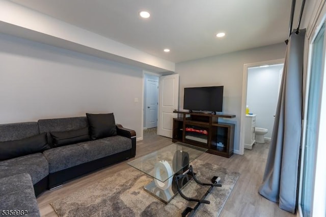 128 Jay Pl, Middlesex Boro, NJ 08846 - living room with wood finished floors, recessed lighting, and baseboards