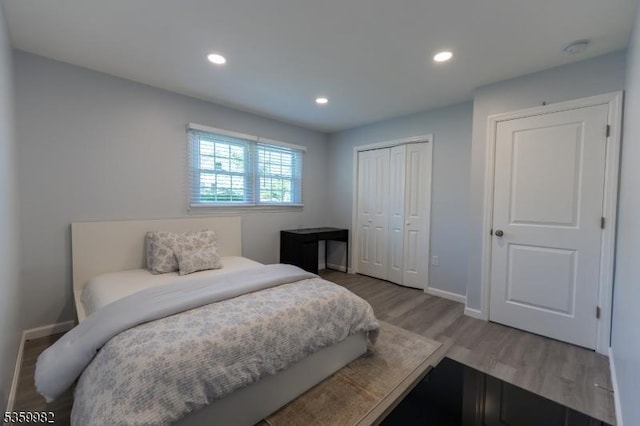 128 Jay Pl, Middlesex Boro, NJ 08846 - bedroom featuring wood finished floors, baseboards, a closet, and recessed lighting