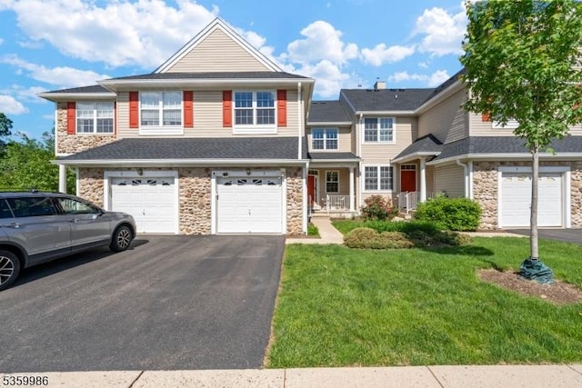 3 River Birch Cir, Montgomery Twp, NJ 08540 - townhome / multi-family property with stone siding, driveway, a front lawn, a garage, and a shingled roof