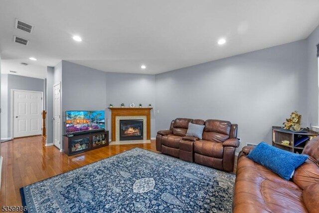 3 River Birch Cir, Montgomery Twp, NJ 08540 - living room with wood finished floors, recessed lighting, a fireplace with flush hearth, and baseboards