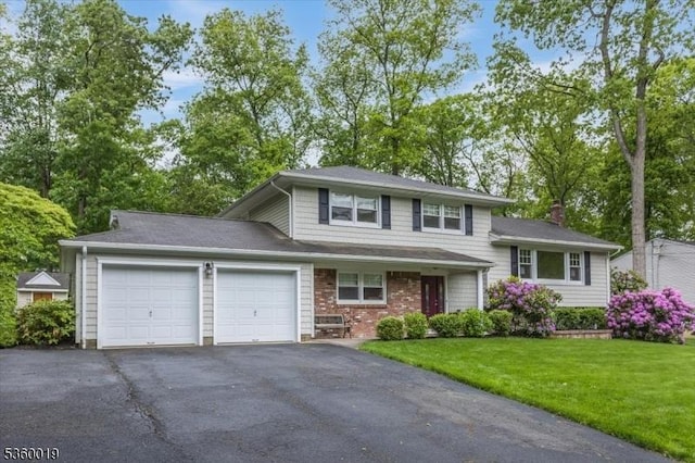 18 W Circuit Dr, Roxbury Twp, NJ 07876 - tri-level home with a garage, asphalt driveway, a front yard, and a chimney