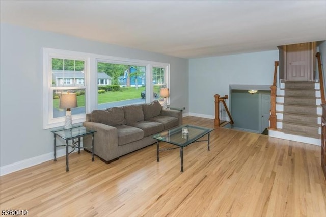 18 W Circuit Dr, Roxbury Twp, NJ 07876 - living room featuring light wood finished floors, baseboards, and stairway