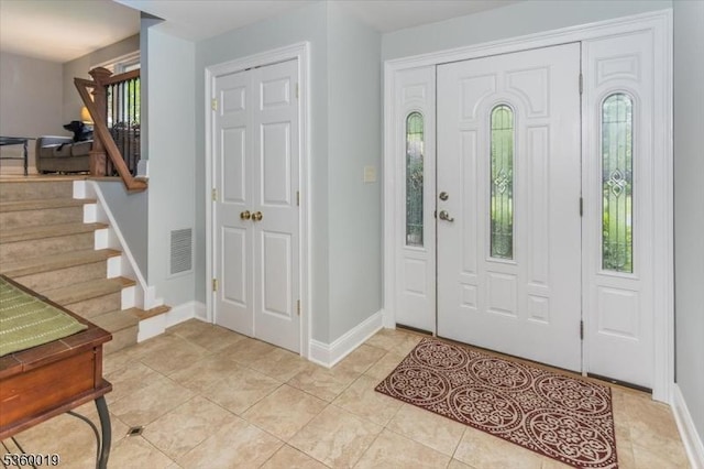 18 W Circuit Dr, Roxbury Twp, NJ 07876 - entryway with stairway, baseboards, and light tile patterned floors