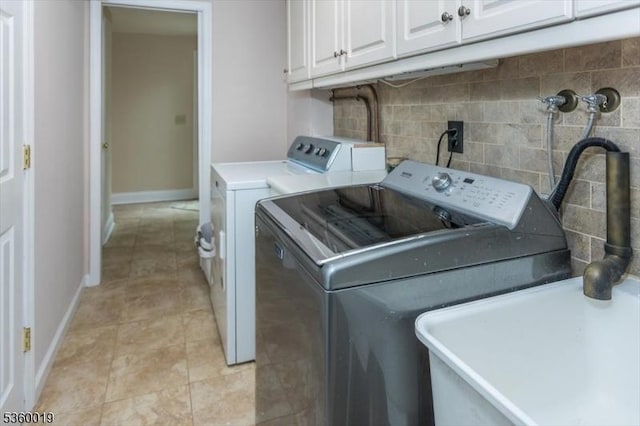 18 W Circuit Dr, Roxbury Twp, NJ 07876 - laundry area featuring cabinet space, washing machine and dryer, baseboards, and light tile patterned floors