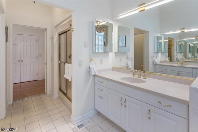 22 Troon Dr, Fredon Twp, NJ 07860 - full bathroom with tile patterned flooring, a stall shower, vanity, and baseboards