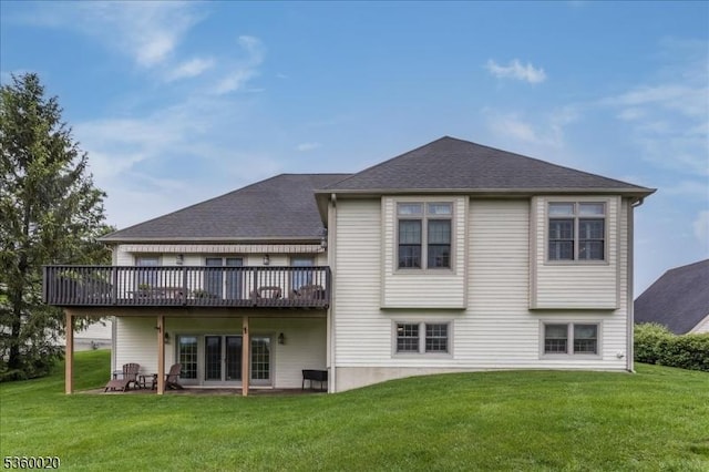 22 Troon Dr, Fredon Twp, NJ 07860 - back of property featuring a deck, a lawn, and roof with shingles