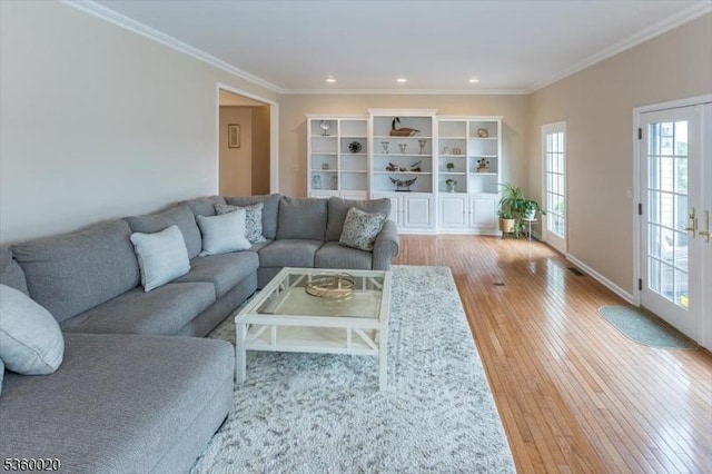 22 Troon Dr, Fredon Twp, NJ 07860 - living room featuring wood-type flooring, ornamental molding, recessed lighting, baseboards, and french doors