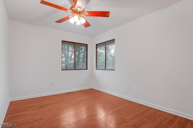 101 River Rd Unit C2, Nutley Twp, NJ 07110 - spare room with wood finished floors, baseboards, and ceiling fan