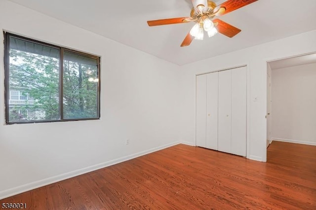 101 River Rd Unit C2, Nutley Twp, NJ 07110 - unfurnished bedroom featuring wood finished floors, baseboards, a closet, and ceiling fan