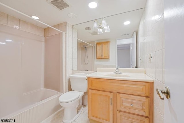 101 River Rd Unit C2, Nutley Twp, NJ 07110 - full bath featuring toilet, vanity, tile walls,  shower combination, and tile patterned floors