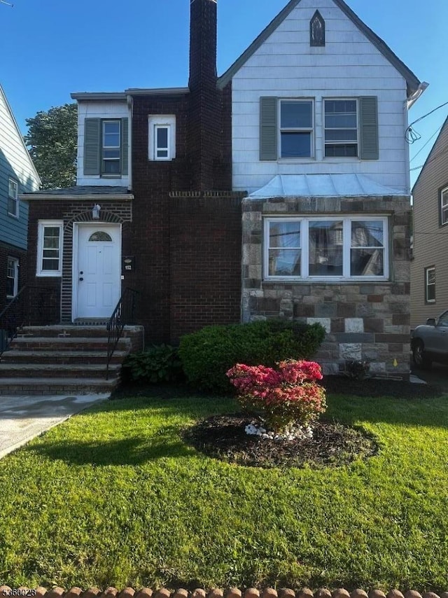 152 Ivy St, Newark City, NJ 07106 - view of front of house with a front lawn and a chimney