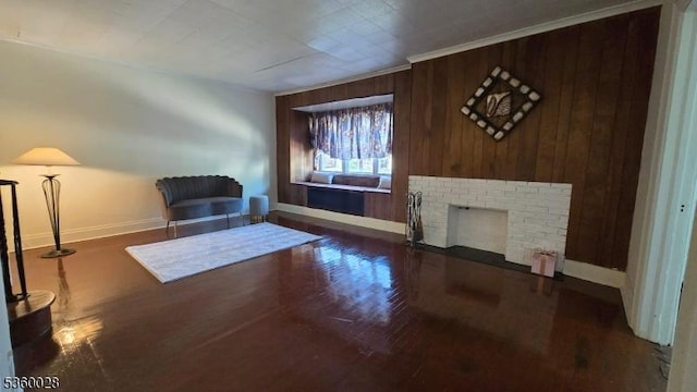 152 Ivy St, Newark City, NJ 07106 - living area with baseboards, wood finished floors, wooden walls, and a brick fireplace