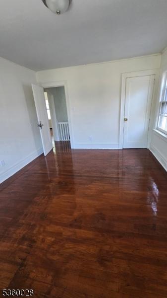 152 Ivy St, Newark City, NJ 07106 - spare room featuring wood finished floors and baseboards
