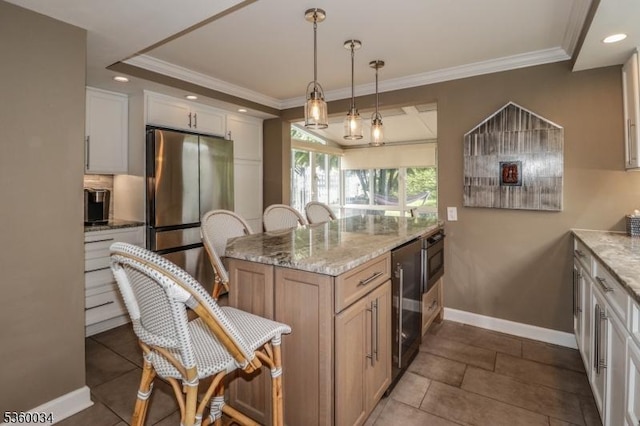 6 Maple Ave, West Orange Twp, NJ 07052 - kitchen featuring freestanding refrigerator, wine cooler, baseboards, ornamental molding, and light stone counters