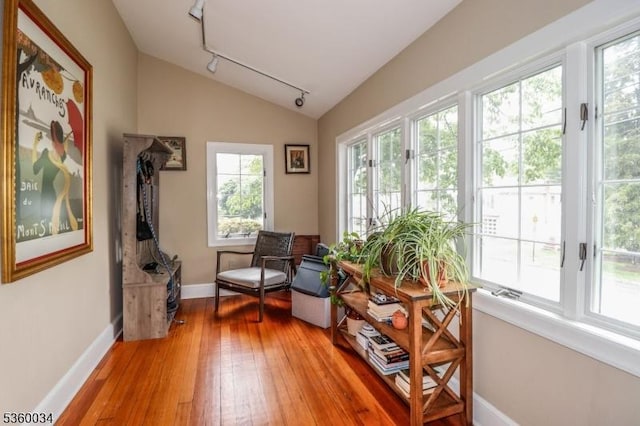 6 Maple Ave, West Orange Twp, NJ 07052 - sitting room with vaulted ceiling, track lighting, light wood-style floors, and baseboards
