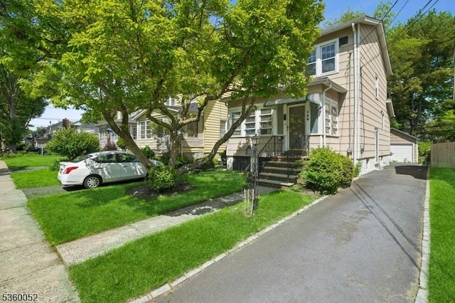 139 S Maple Ave, Springfield Twp, NJ 07081 - view of front facade with an outbuilding and a front yard