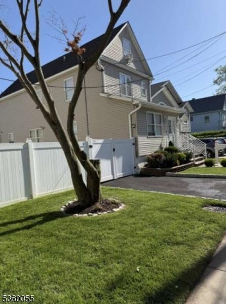 284 W Webster Ave, Roselle Park Boro, NJ 07204 - view of side of home with a gate