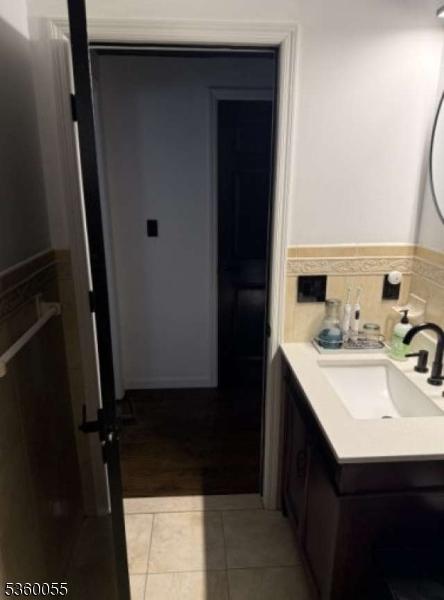 284 W Webster Ave, Roselle Park Boro, NJ 07204 - bathroom with vanity and tile patterned floors