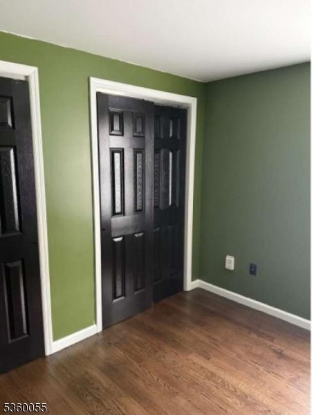 284 W Webster Ave, Roselle Park Boro, NJ 07204 - entryway featuring baseboards and wood finished floors