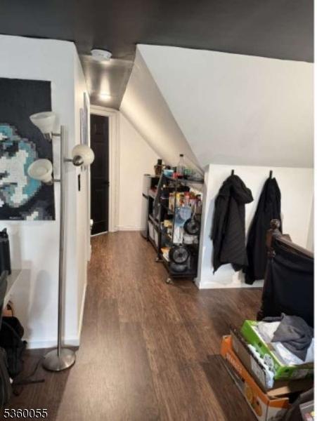 284 W Webster Ave, Roselle Park Boro, NJ 07204 - additional living space featuring wood finished floors and vaulted ceiling