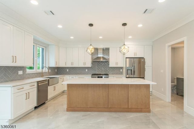 56B Jefferson Ave, Emerson Boro, NJ 07630 - kitchen with appliances with stainless steel finishes, wall chimney range hood, a center island, white cabinets, and crown molding