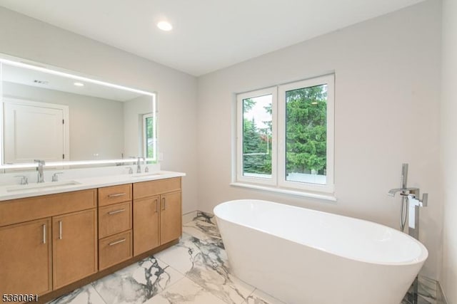 56B Jefferson Ave, Emerson Boro, NJ 07630 - full bath featuring marble finish floors, healthy amount of natural light, double vanity, a freestanding tub, and recessed lighting
