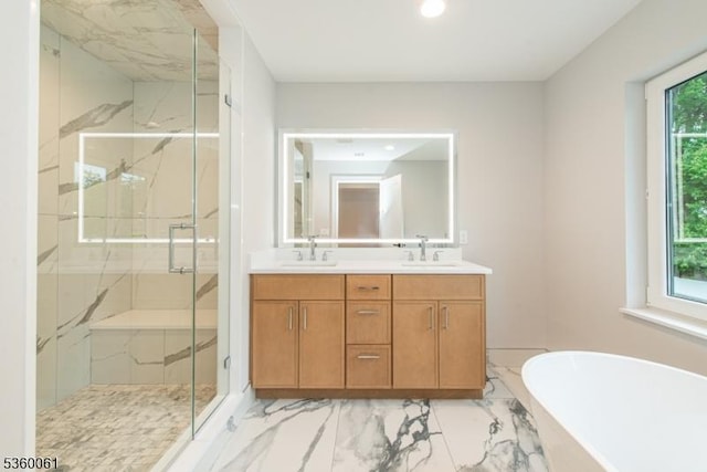 56B Jefferson Ave, Emerson Boro, NJ 07630 - bathroom featuring marble look tile flooring, a marble finish shower, a freestanding bath, double vanity, and recessed lighting