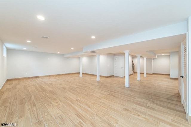 56B Jefferson Ave, Emerson Boro, NJ 07630 - finished below grade area with light wood-style floors, recessed lighting, and baseboards