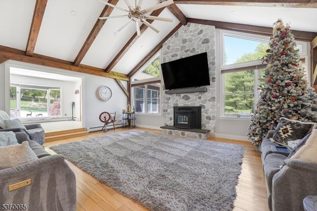 26 Danville Mountain Rd, Liberty Twp, NJ 07838 - living area with a ceiling fan, a baseboard heating unit, wood finished floors, baseboards, and a fireplace