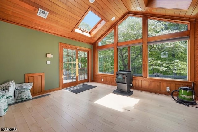 26 Danville Mountain Rd, Liberty Twp, NJ 07838 - unfurnished sunroom with a wood stove, lofted ceiling, and a skylight