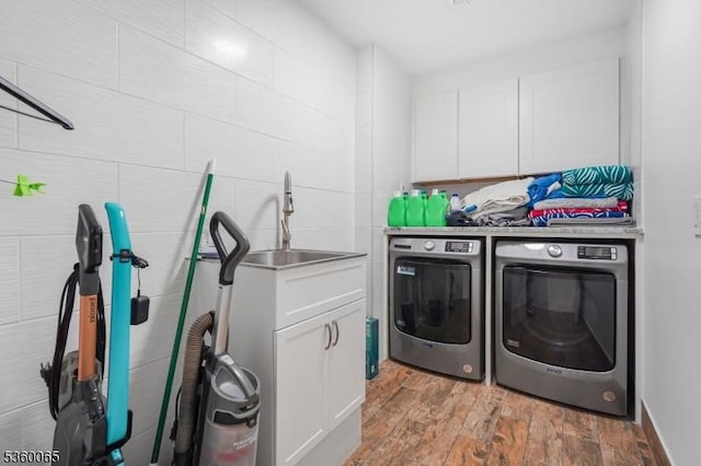 26 Danville Mountain Rd, Liberty Twp, NJ 07838 - washroom with washing machine and clothes dryer, wood finished floors, and cabinet space