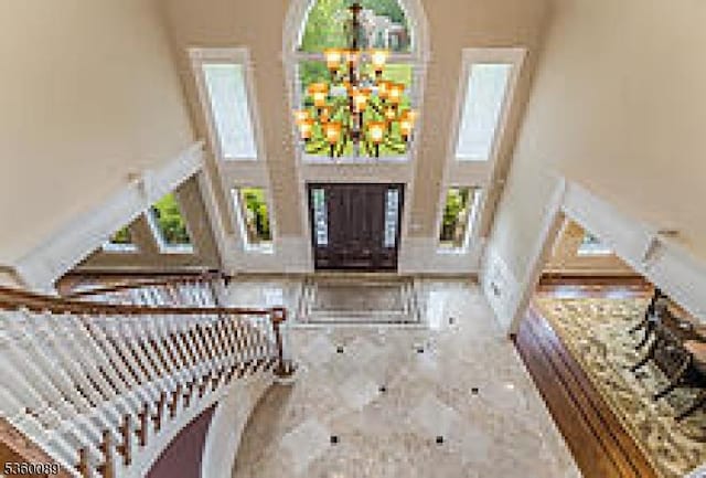 2 Kristina Way, Raritan Twp, NJ 08822 - foyer with a towering ceiling and a chandelier