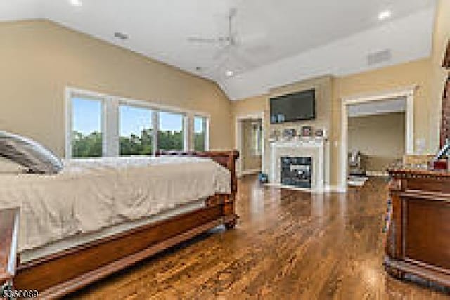 2 Kristina Way, Raritan Twp, NJ 08822 - bedroom with vaulted ceiling, wood finished floors, and a fireplace