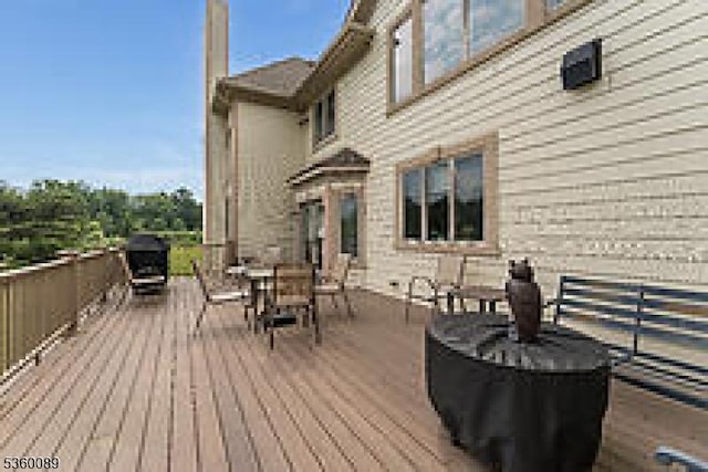 2 Kristina Way, Raritan Twp, NJ 08822 - wooden terrace featuring outdoor dining space