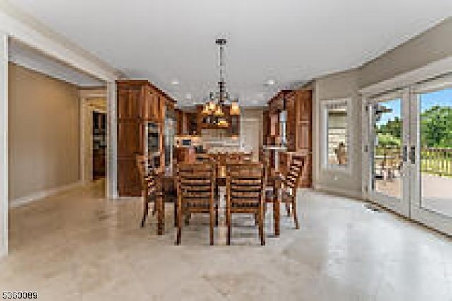 2 Kristina Way, Raritan Twp, NJ 08822 - dining space with a chandelier and baseboards