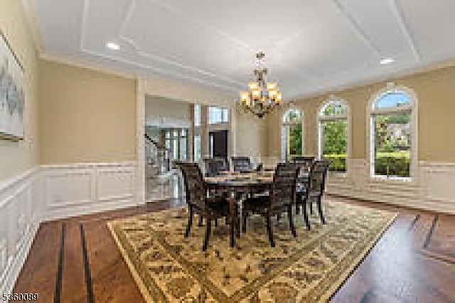 2 Kristina Way, Raritan Twp, NJ 08822 - dining space with a chandelier, a decorative wall, a wainscoted wall, and wood finished floors