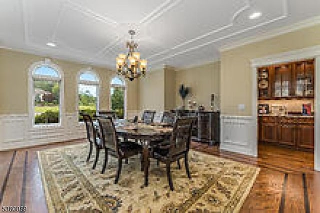 2 Kristina Way, Raritan Twp, NJ 08822 - dining area with wood finished floors, wainscoting, crown molding, and a chandelier