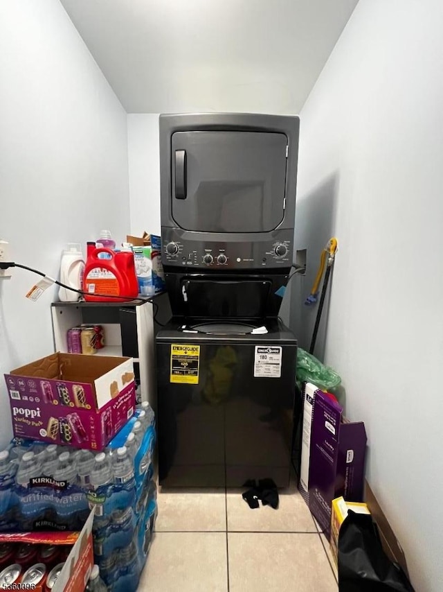 85 Tillinghast St, Newark City, NJ 07108 - kitchen featuring stacked washer / drying machine and light tile patterned floors