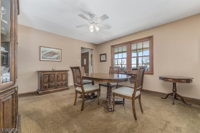 249 Good Springs Rd, Franklin Twp, NJ 08886 - dining area featuring a ceiling fan, light carpet, and baseboards