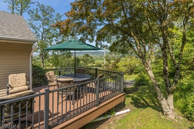 249 Good Springs Rd, Franklin Twp, NJ 08886 - wooden terrace with outdoor dining space and a yard