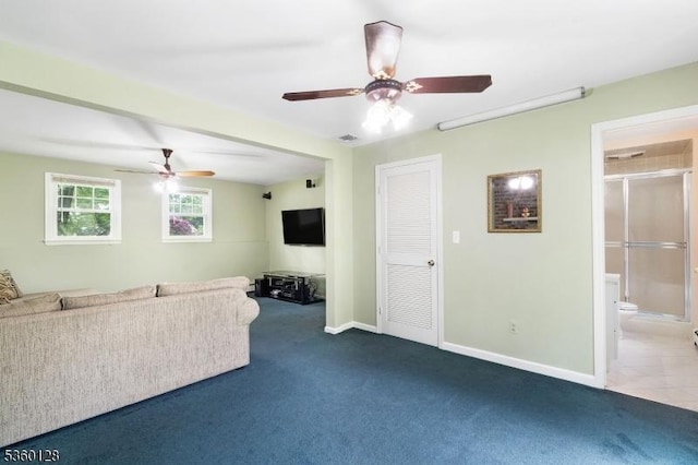 54 Pitman Rd, Parsippany-Troy Hills Twp, NJ 07054 - unfurnished living room featuring a ceiling fan, dark carpet, and baseboards