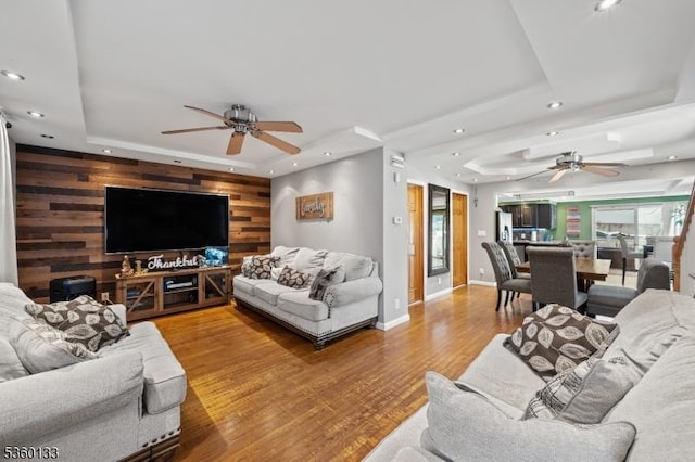 100 N 8th St, Paterson City, NJ 07522 - living area featuring a raised ceiling, ceiling fan, recessed lighting, wood finished floors, and wooden walls